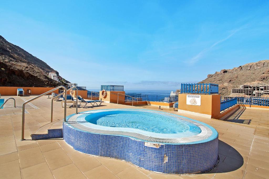Apartamento de vacaciones 'Paraíso Taurito' con vistas al mar, terraza, piscina compartida y Wi-Fi — 3