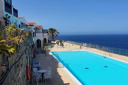 Apartamento muy romántico con vistas al mar y piscina climatizada. - Vacation Home — 4